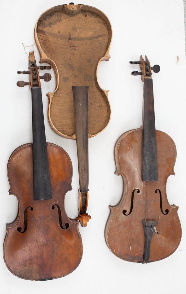 Three violins in need of repair