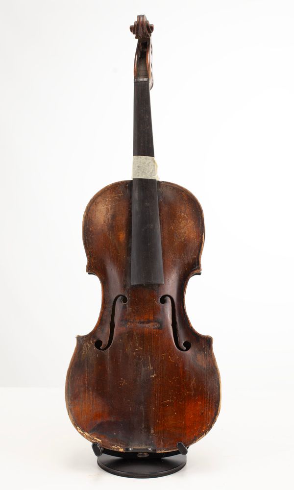 A broken violin, unlabelled