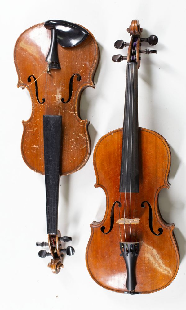 Four violins, varying sizes