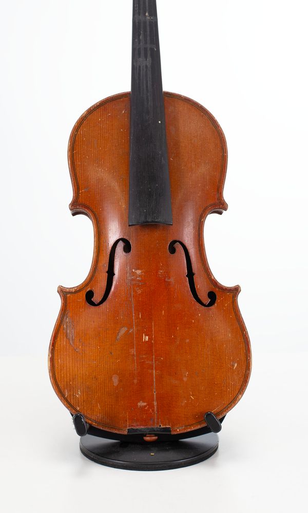A half-sized violin and a quarter-sized violin