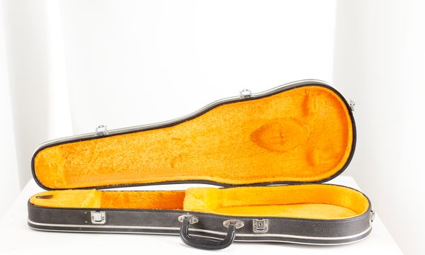 A bundle of three violin cases