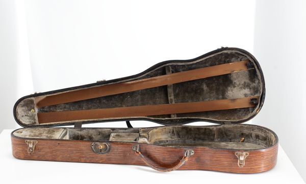 A bundle of three violin cases
