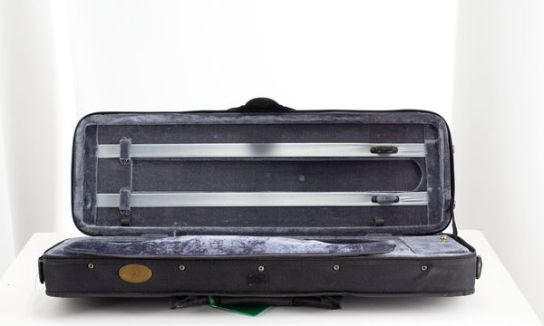 A bundle of three violin cases