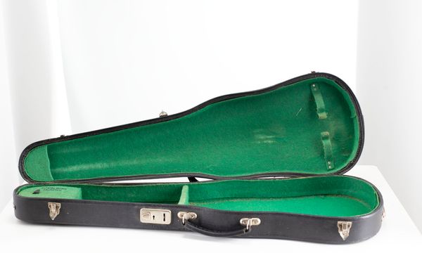 A bundle of three violin cases