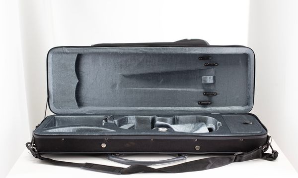 A bundle of two violin cases