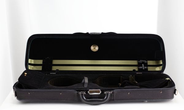 A bundle of three violin cases