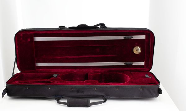 A bundle of three violin cases