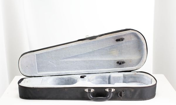 A bundle of three violin cases