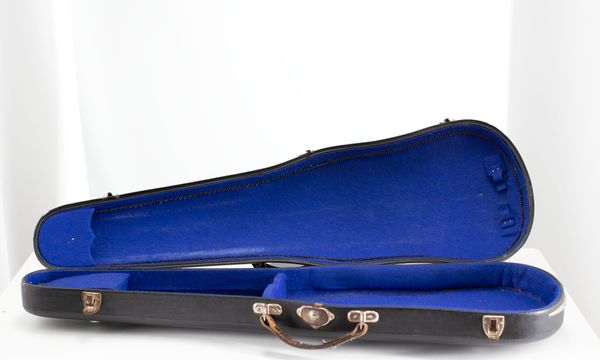 A bundle of three violin cases
