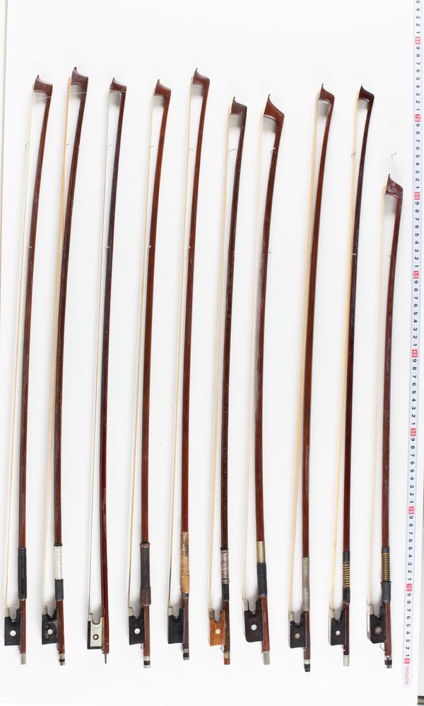 A bundle of fourteen bows, varying sizes