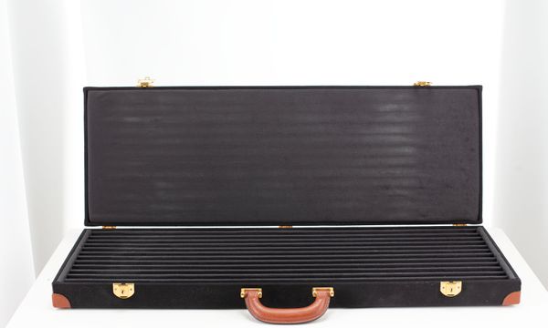 A twelve slot bow case, unbranded