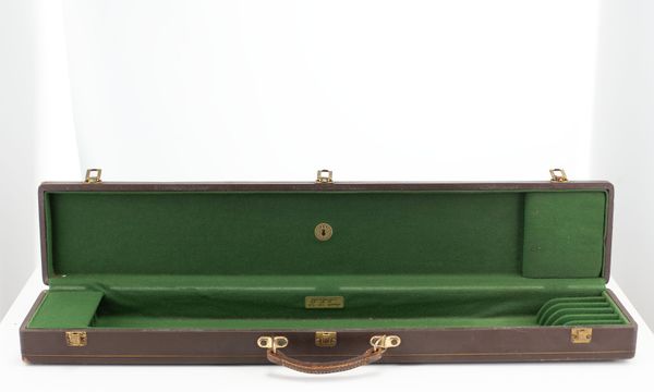 A six slot bow case, branded M. A. Gordge