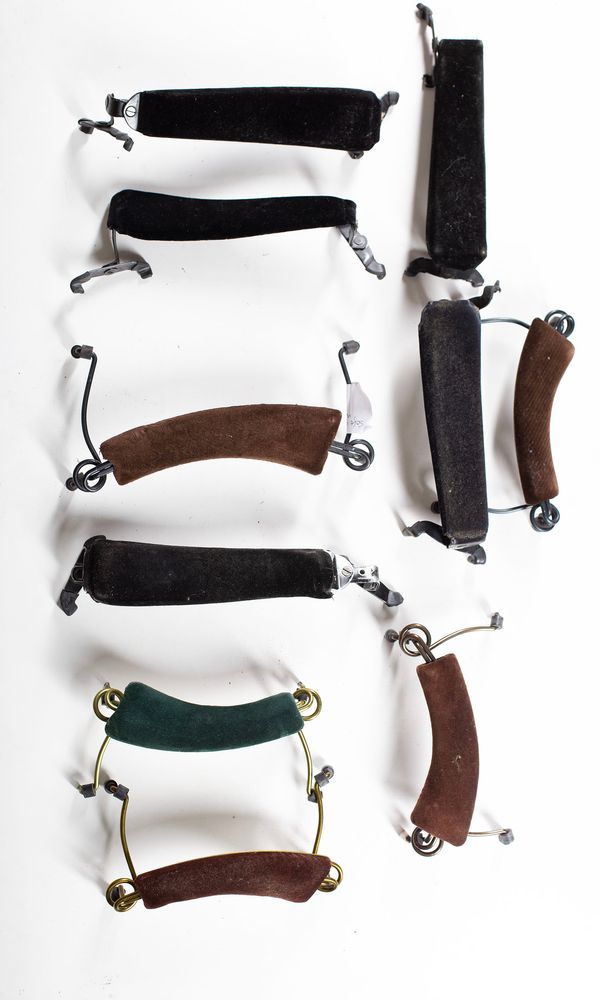 A bundle of ten shoulder rests, varying sizes
