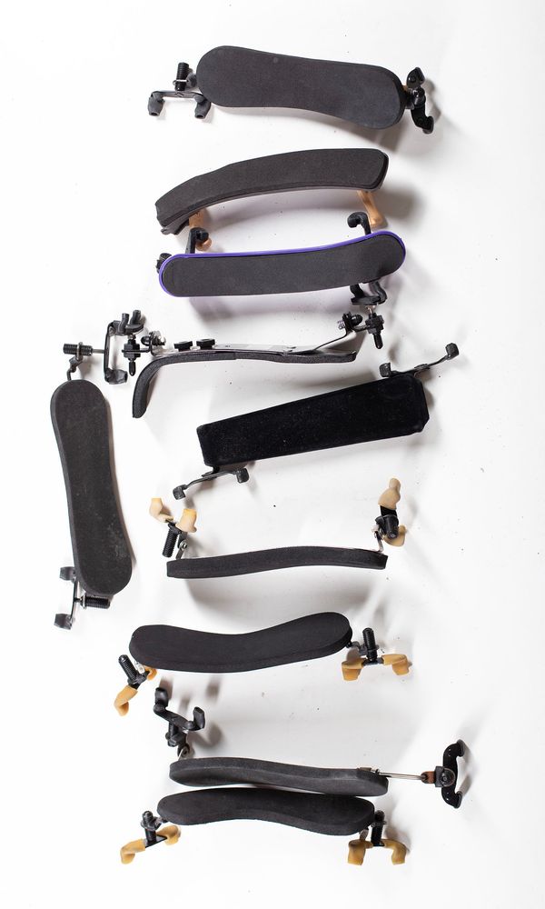 A bundle of ten shoulder rests, varying sizes