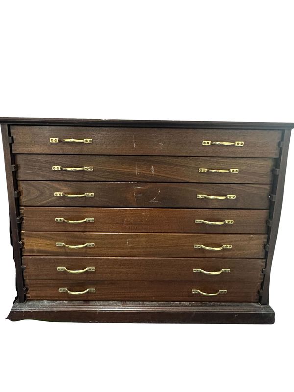 A bow cabinet with seven drawers for 41 violin/cello bows