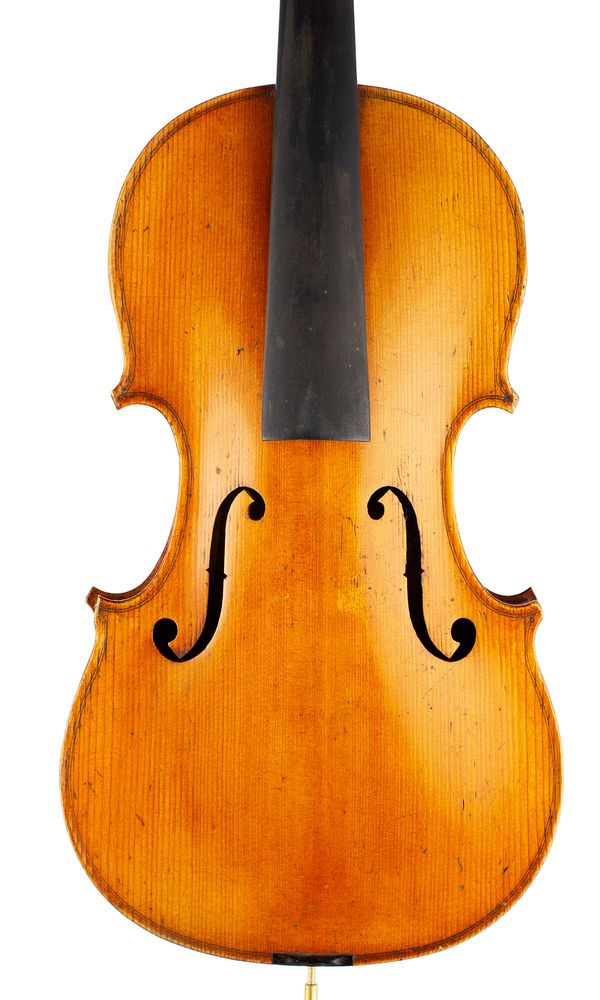 A violin, labelled Medio-Fino