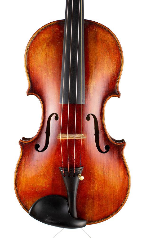 A violin, labelled Andreas Amati