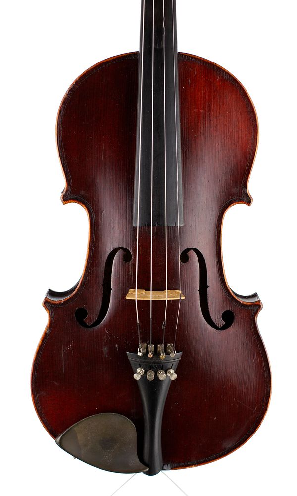 A violin, labelled Medio Fino