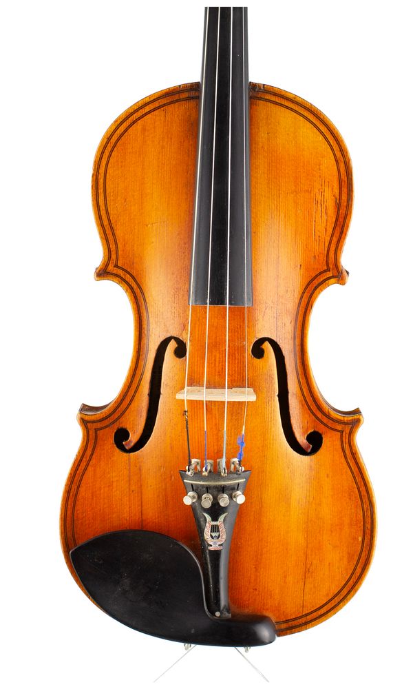 A violin, labelled Ch. J.B. Collin-Mezin