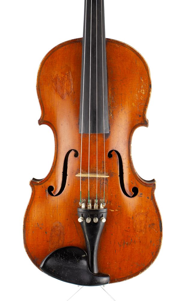 A violin, labelled Gustav Huslar