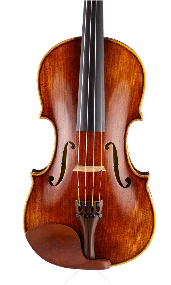 A violin, labelled Guarneri del Gesu