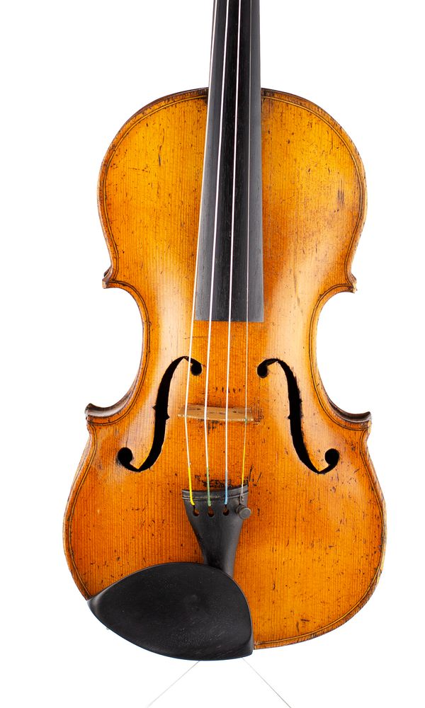 A violin, labelled Carlo Antonio Testore  Over 100 years old