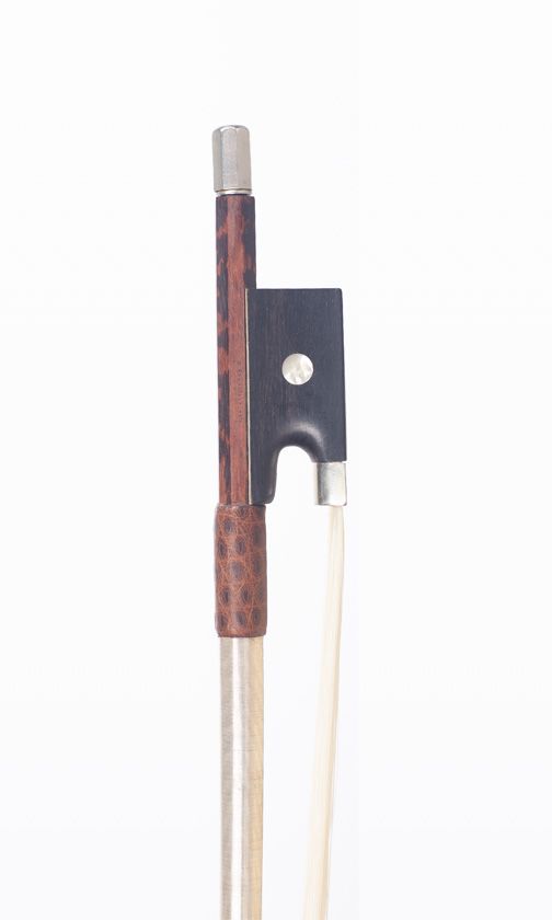 A nickel-mounted violin bow, branded [indistinctly]