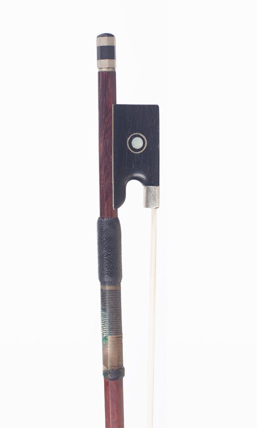 A nickel-mounted violin bow, branded Pecatte