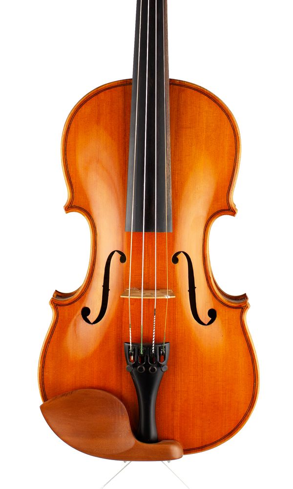 A violin, labelled Chen Zu Hua