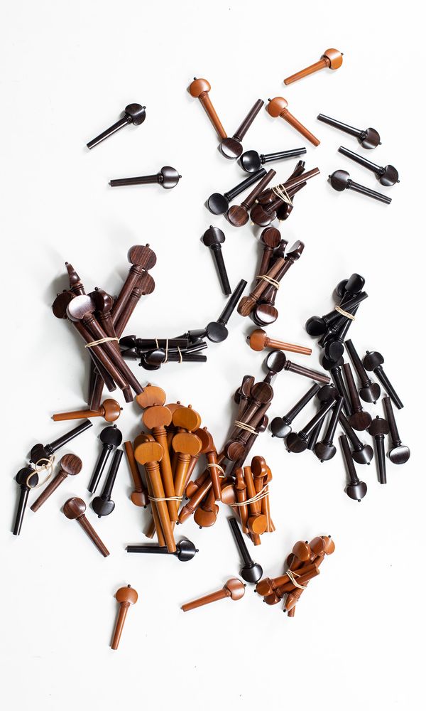 A small quantity of  cello and violin pegs