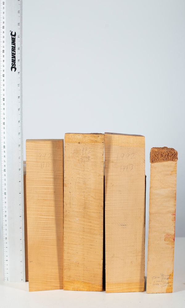 Four violin scroll blocks, maple