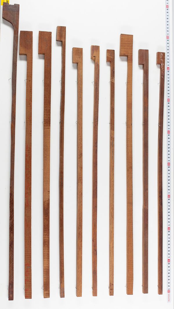 Fourteen partially made pernambuco bows, various sizes