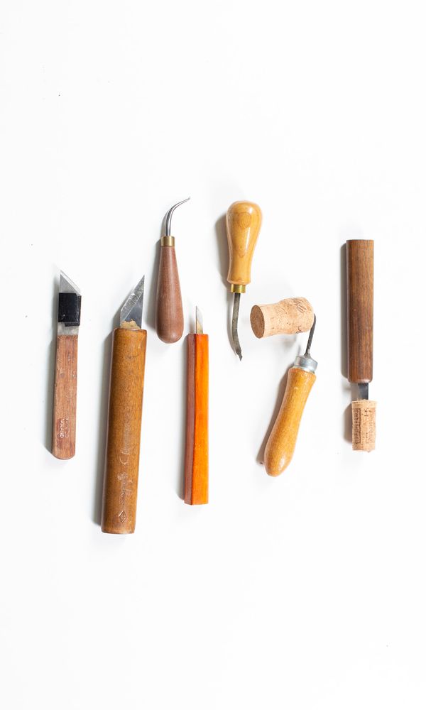 Four carving knives and three awls