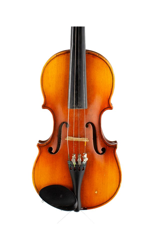 A child's size violin, labelled Skylark