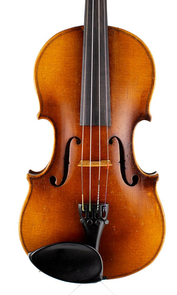 A three-quarter sized violin, labelled Antonius Stradivarius