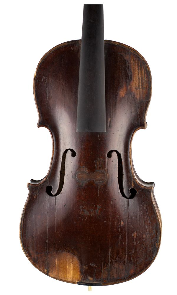 A violin, labelled Repaired by John Carr