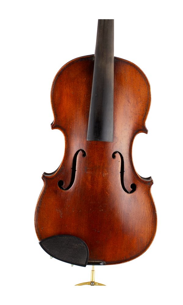 A half-sized violin, labelled Medio Fino