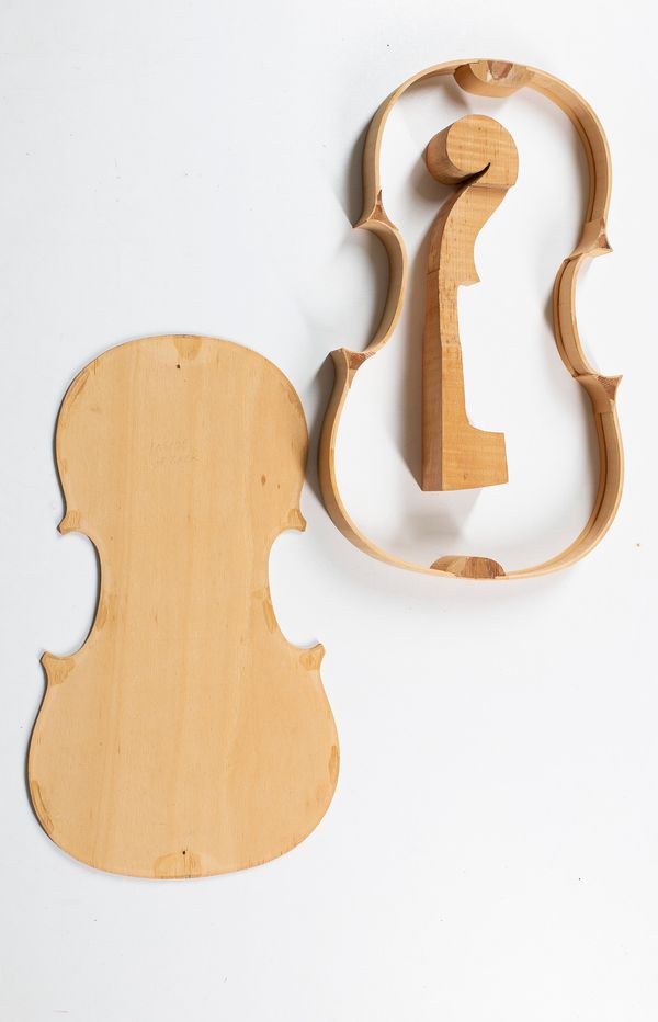 Two partially made violins body