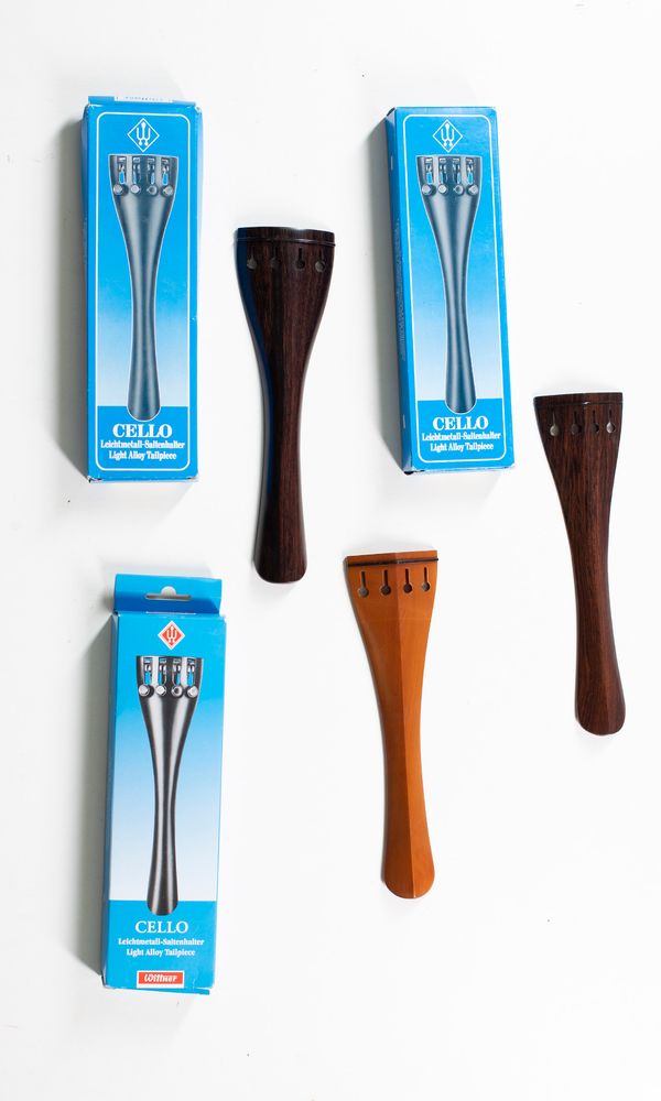 Six cello tailpieces