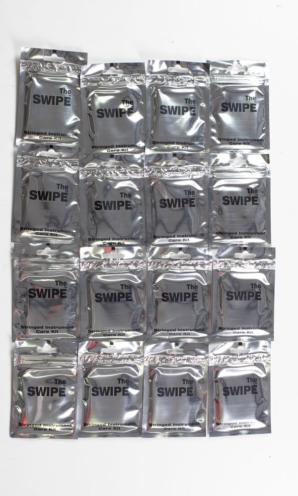 Twenty-four stringed instrument care kits