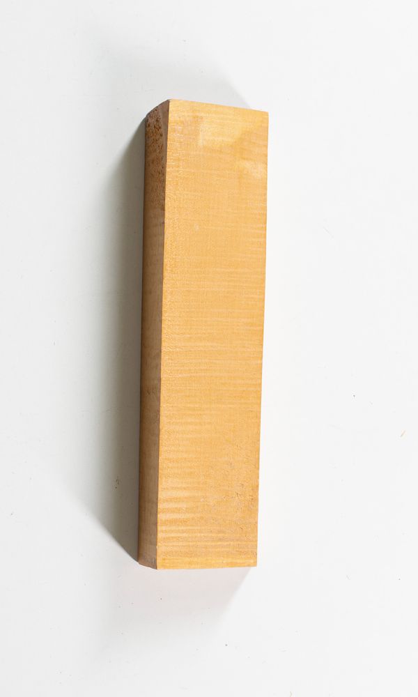 A scroll block, maple