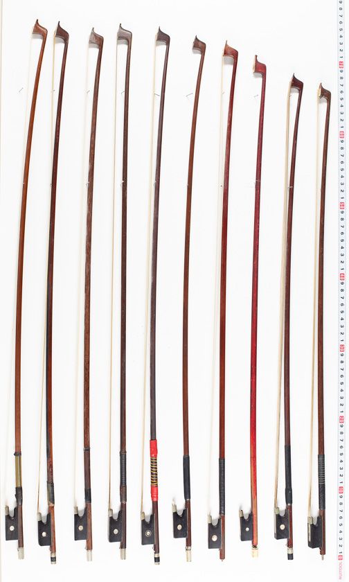 Eighteen violin bows,  varying lengths