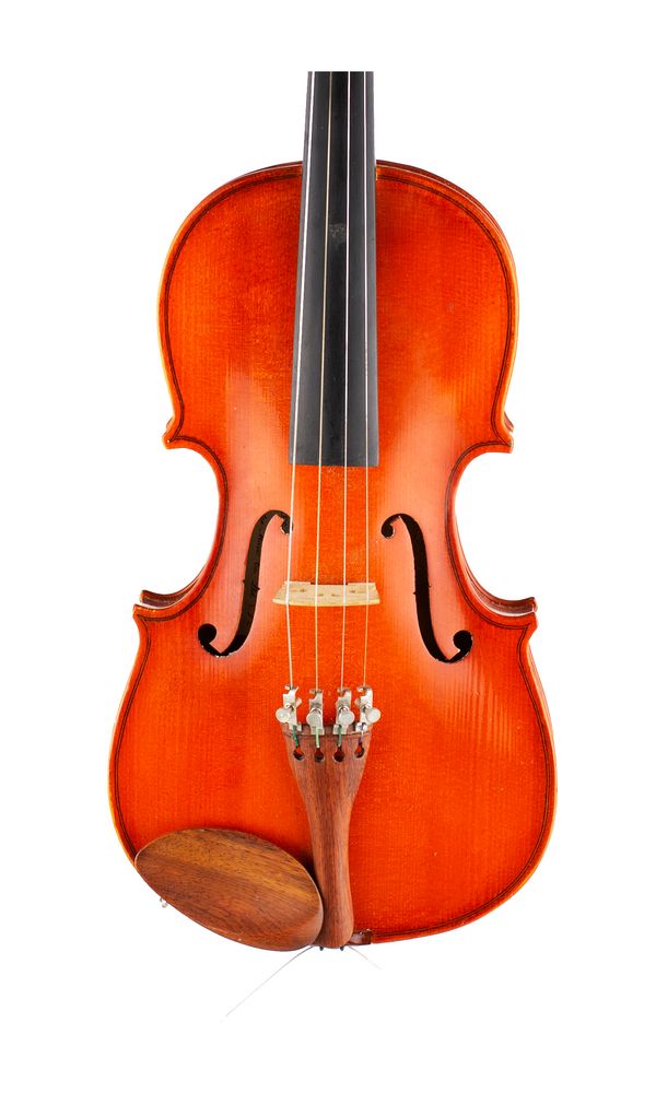 A child size violin, labelled Stentor