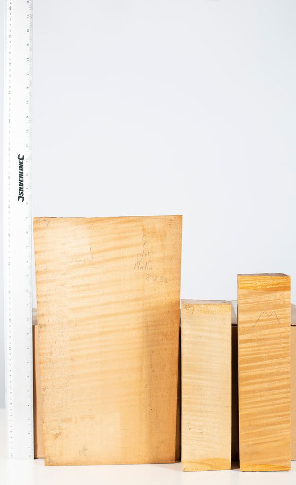 Three pieces of maple wood