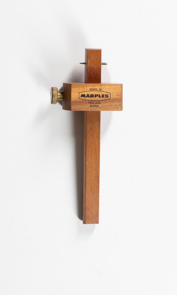 A marking gauge and a compass set