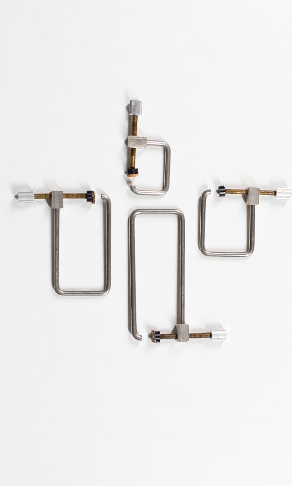 Four f-hole clamps