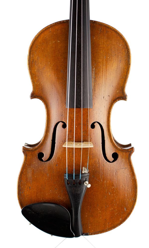 A three-quarter violin, labelled Antonius Stradivarius