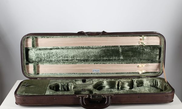 A violin case, branded J. Winter