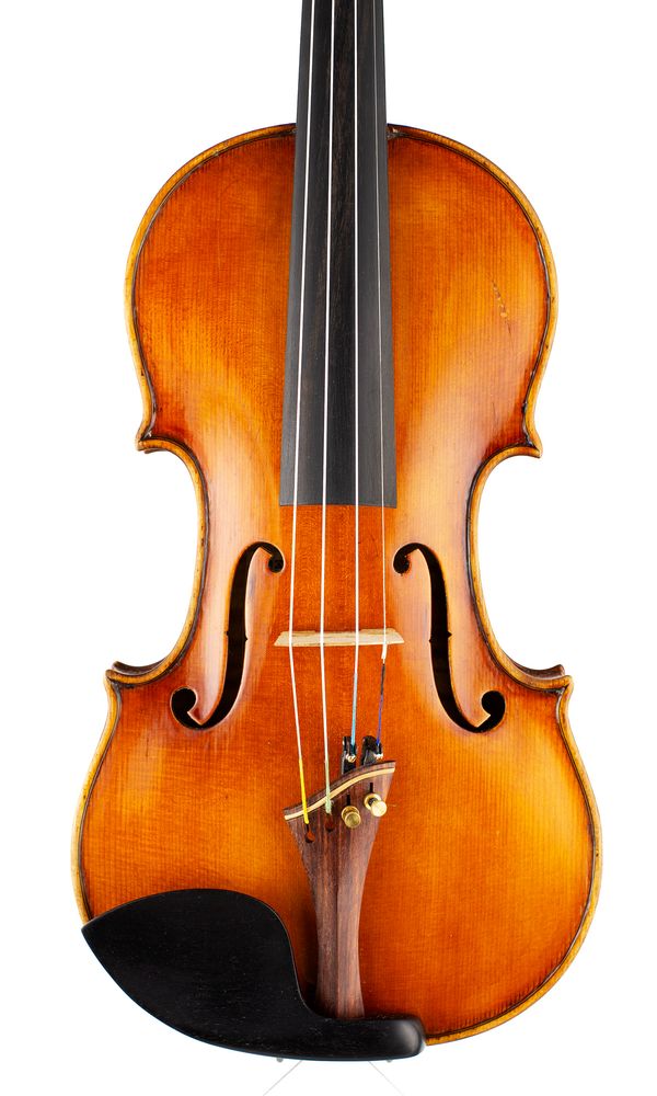 A violin, labelled Carlo Bisiach di Leandro