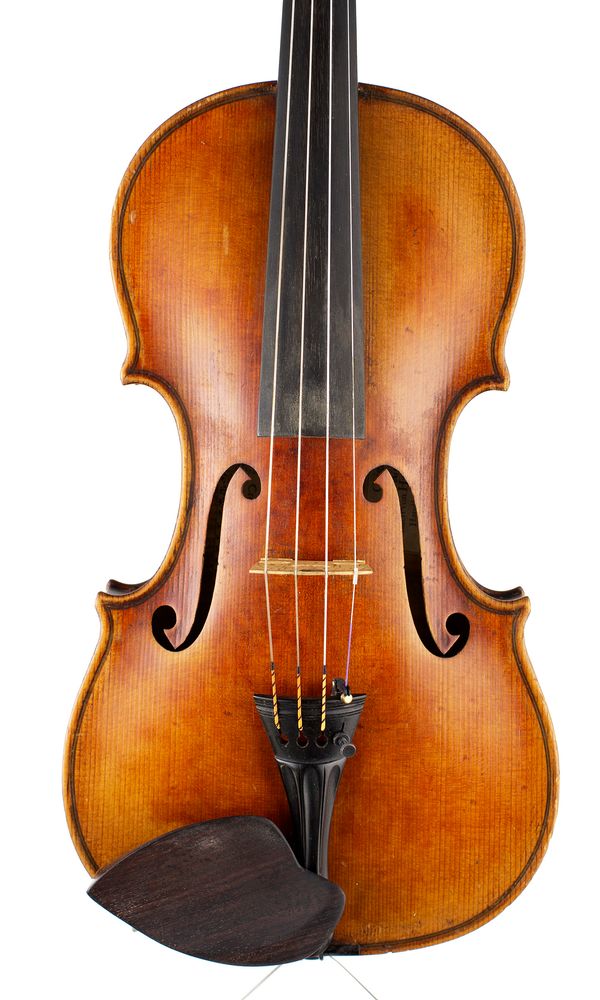 A violin, labelled Petrus Guarnerius Filius Jofeph